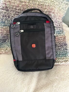 SwissGear Black and Gray Compact travel Sling with Red Accent